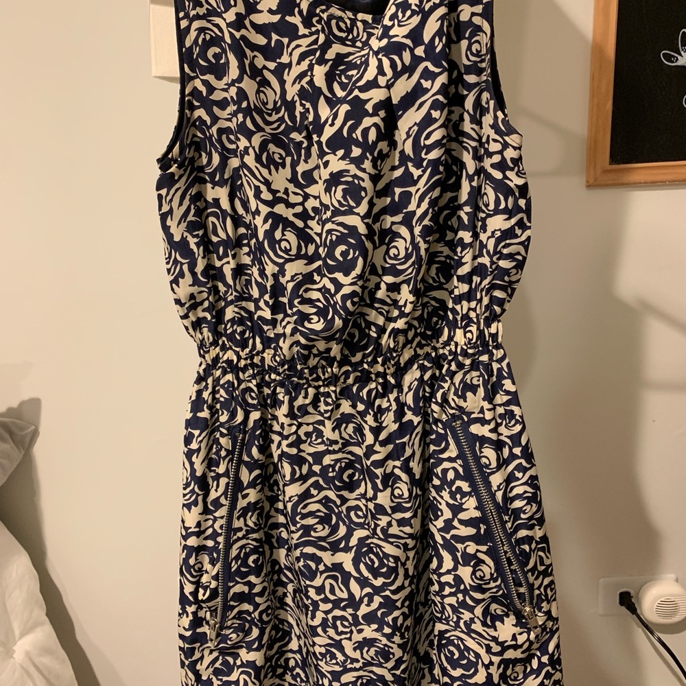 Adorable blue and cream dress with zipper pockets